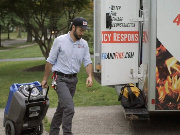 A member of the Cleveland Water and Fire Remediation Team at work